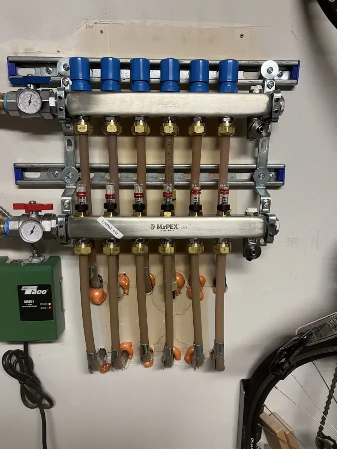 Plumber performing Water Heater Repair at a residential property in Brooklyn